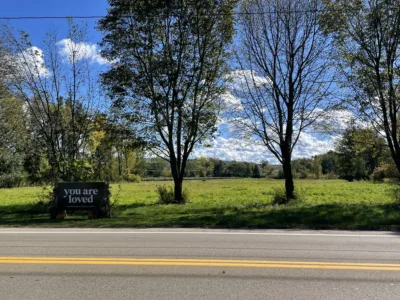 Sales include property for church, land near camp